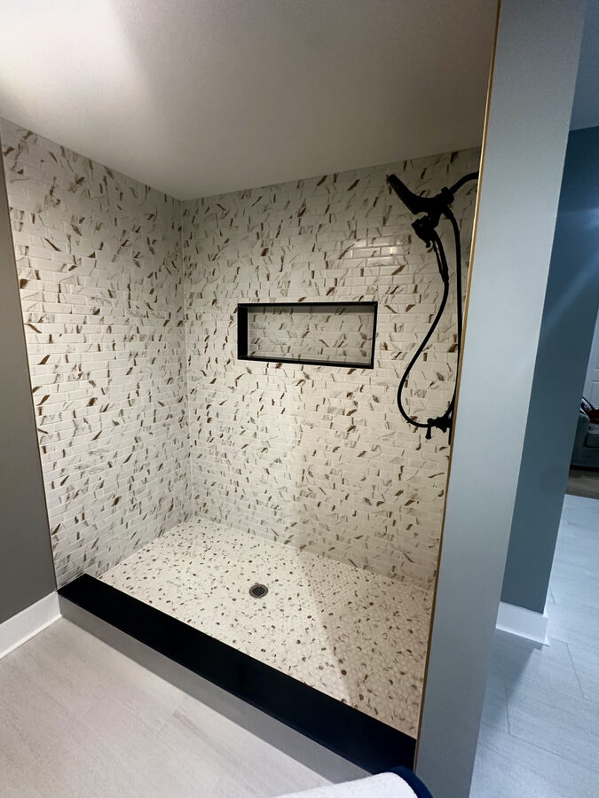 Custom tile shower with built-in niche