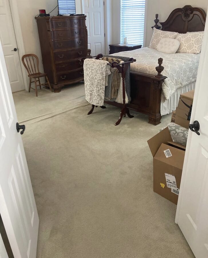 Bedroom carpet before hardwood installation